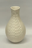 White Carved Vase 7.5”High x 4.75”Diameter Also in includes the Avanyu (Serpent) by Tony Sangre- Isleta Pueblo