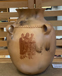 Micaceous Jar, Four Loop Handles and Carved Band At the Top with Three Pueblo Women 4”High the Jar is 13.75”High x 9.75”Diameter by Kathleen Wall - Jemez Pueblo